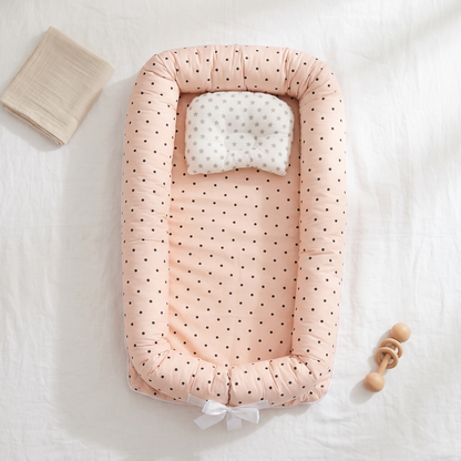 Haven portable baby support nest, pink polka dots, product photo
