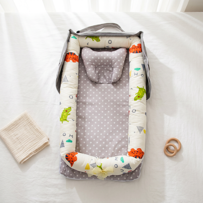 Haven portable baby support nest, colorful dinosaurs, product photo